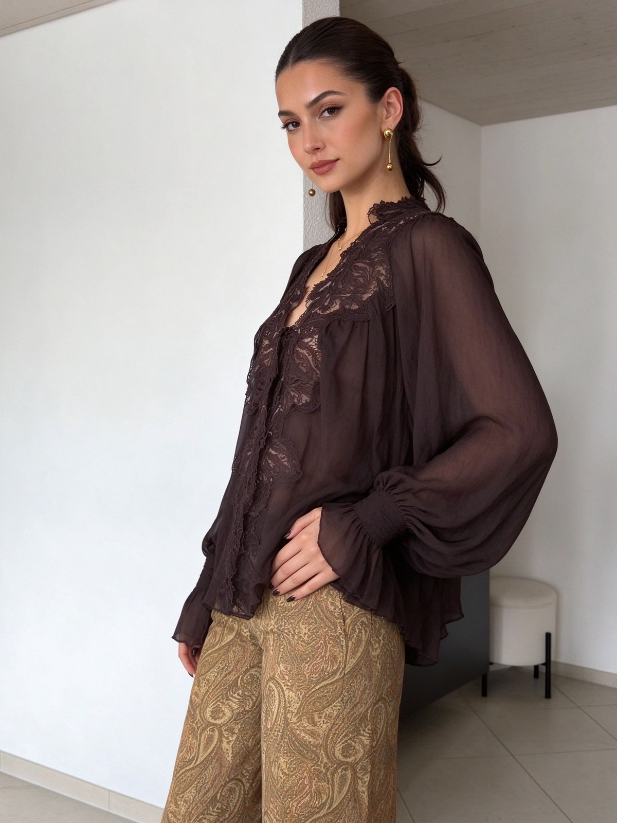 Chiffonblouse van kant met strikdetail